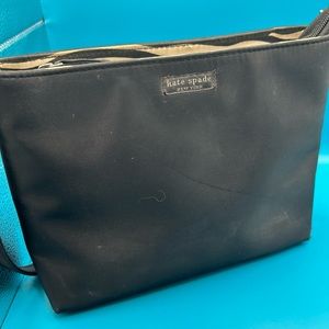 KATE SPADE bag with the zebra lining. Her bags are so cute.